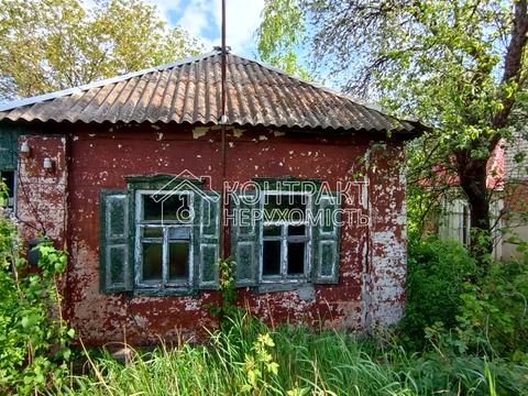 будинок за адресою Шкільна вул., 1