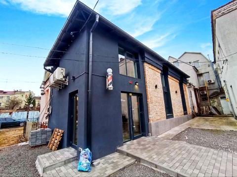 комерційна за адресою Грушевського вул., 57