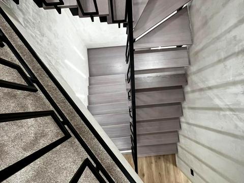 будинок за адресою Коновальця