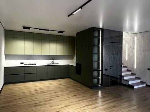 будинок за адресою Коновальця