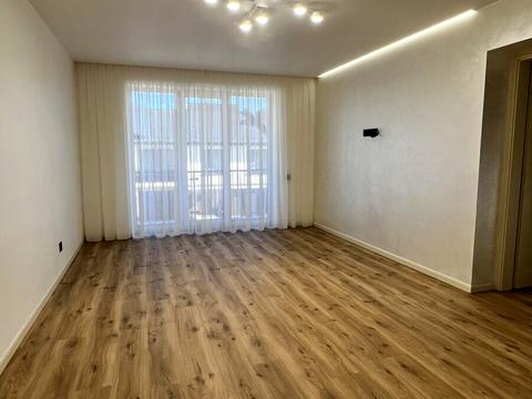 будинок за адресою Коновальця