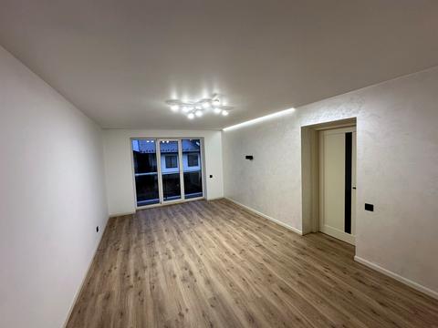 будинок за адресою Коновальця