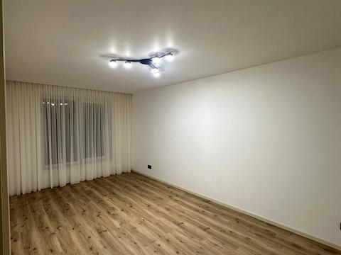 будинок за адресою Коновальця