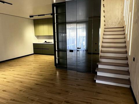 будинок за адресою Коновальця