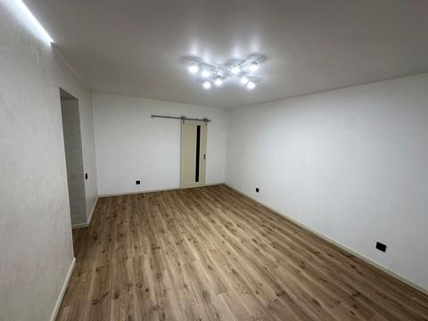 будинок за адресою Коновальця