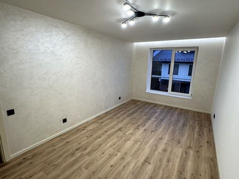 будинок за адресою Коновальця