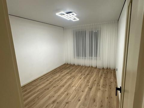 будинок за адресою Коновальця