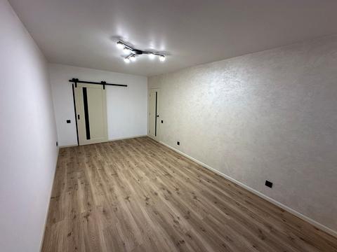 будинок за адресою Коновальця