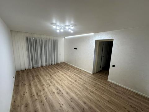 будинок за адресою Коновальця