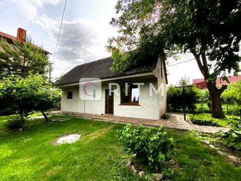 будинок за адресою с. Тарасове, Набережна вул., 23