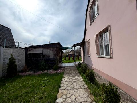 будинок за адресою Колійна вул. (Вороніна), 126