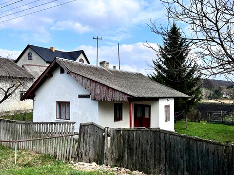 будинок за адресою Унів
