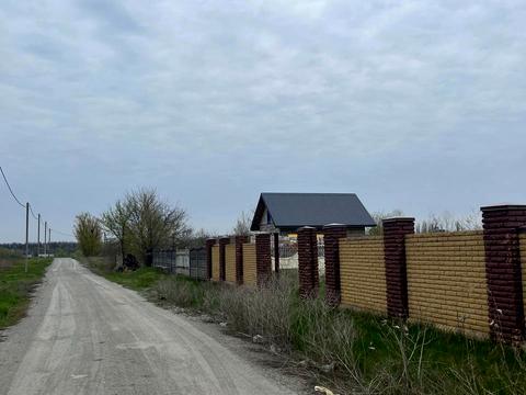 участок по адресу Тополинна