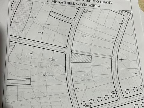 участок по адресу Наталії Ужвій