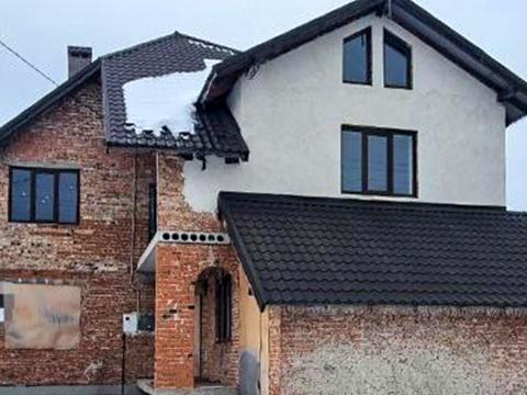 будинок за адресою Юліана Романчука, 15