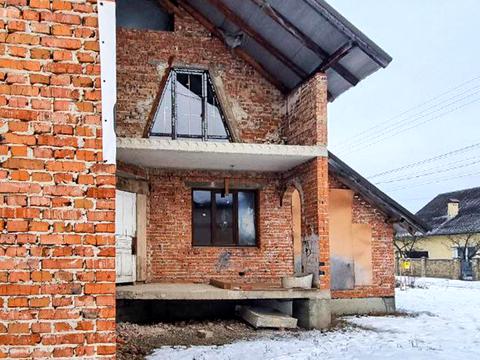 будинок за адресою Юліана Романчука, 15