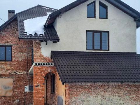 будинок за адресою Юліана Романчука, 15