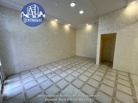 комерційна за адресою Марії Заньковецької вул., 23