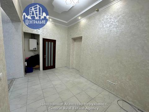 комерційна за адресою Марії Заньковецької вул., 23