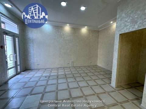комерційна за адресою Марії Заньковецької вул., 23