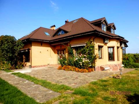 будинок за адресою с. Великі Дмитровичі, Польова, 212