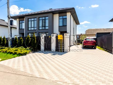 будинок за адресою с. Ходосівка, Соборна вул., 1В