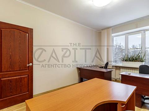 комерційна за адресою Шовковична вул., 7-А
