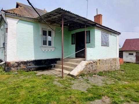 будинок за адресою смт. Вороновиця, Паріївська