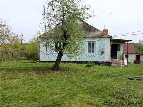 будинок за адресою смт. Вороновиця, Паріївська
