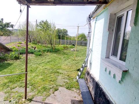 будинок за адресою смт. Вороновиця, Паріївська