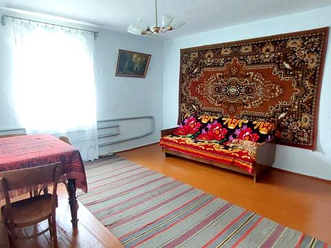 будинок за адресою смт. Вороновиця, Паріївська