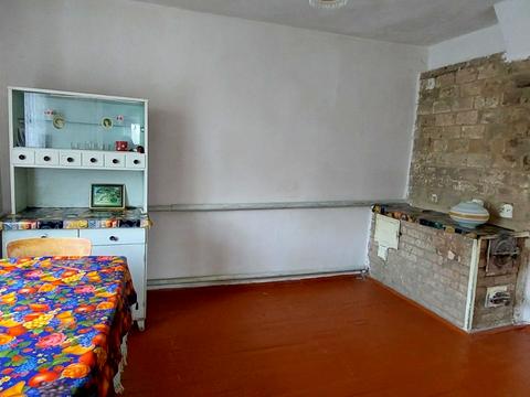 будинок за адресою смт. Вороновиця, Паріївська