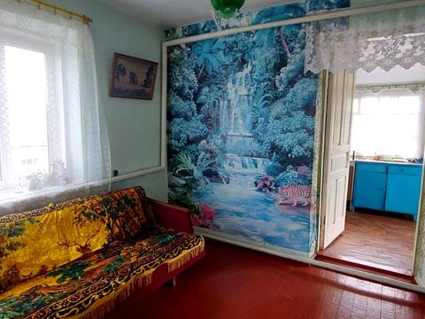 будинок за адресою смт. Вороновиця, Паріївська