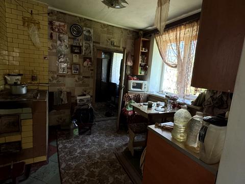 будинок за адресою Першотравнева, 63