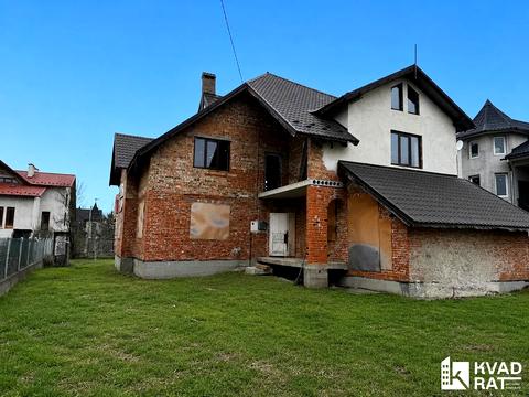 будинок за адресою Романчука, 15