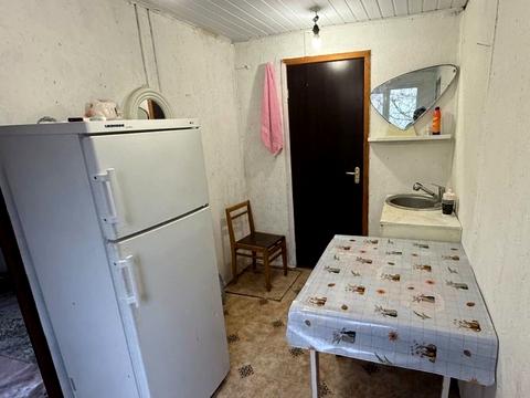 будинок за адресою с. Пороскотень, Центральна