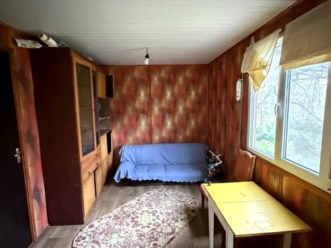 будинок за адресою с. Пороскотень, Центральна