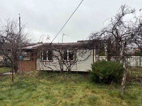 будинок за адресою с. Пороскотень, Центральна