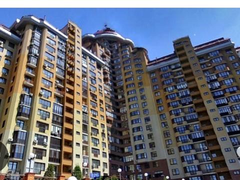 паркомісце за адресою Євгена Коновальця вул. (Щорса), 32-Б