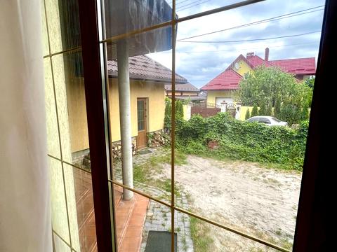 будинок за адресою Євгена Коновальця вул., 24