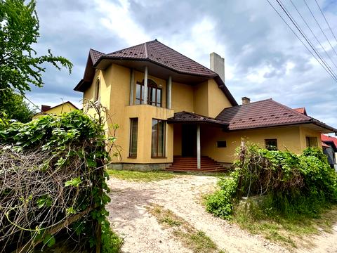 будинок за адресою Євгена Коновальця вул., 24