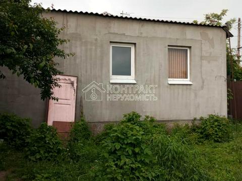 будинок за адресою Прилуцька вул. (Томська), 30