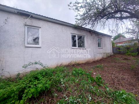 будинок за адресою смт. Високий, Чернишевского вул., 1