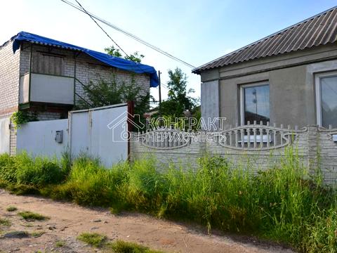 будинок за адресою Купецький пров. (Югорський), 1