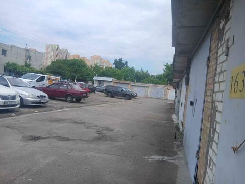 паркомісце за адресою Сім'ї Кульженків вул. (Петра Дегтяренка), 21
