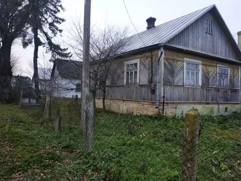 будинок за адресою с. Варковичі, на Дворці