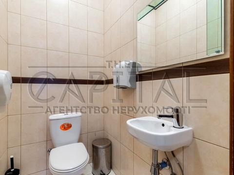 комерційна за адресою Євгена Коновальця вул. (Щорса), 32-Б
