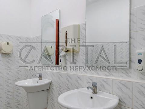 комерційна за адресою Євгена Коновальця вул. (Щорса), 36-Б