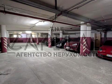 паркомісце за адресою Євгена Коновальця вул. (Щорса), 36-Б