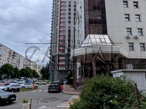 паркомісце за адресою Євгена Коновальця вул. (Щорса), 36-Б